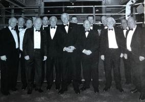 Our guest of honour Sir Henry Cooper OBE, KSG. Our Enery. Flanked by some notable Rotarians Neal Elliott, David Mirsky, John Reid, Roger Rook (sadly now deceased) and (Hon member of our club) Frank Thornley.
