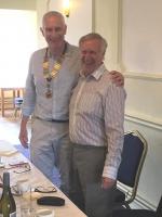 Michael Parrott presenting the Chain of Office to Tony Hoy