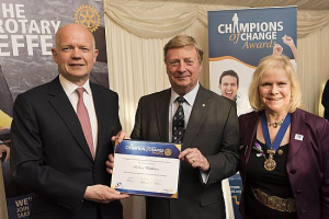 Robbie Middleton receiving his "Champions of Change Award" from Lord Hague.
