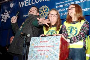 Witney Mayor Chris Woodward assisted by Interact Members Naimh Nowlan, 14, and Isobel Lodge prepare to hit tyhe switch