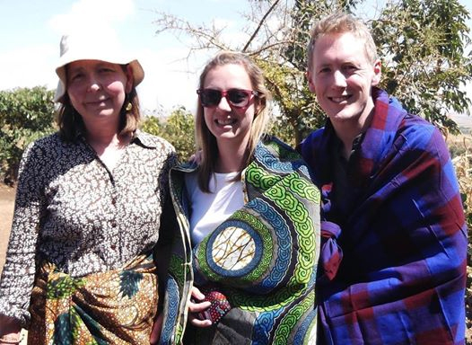 The Staff from Ellesmere College visiting the Olarash area of Monduli, wearing traditional dress! (Left to Right - Cathy Allen, founder - Rhiann Waddams, Head of Geography - Ben Waddams)