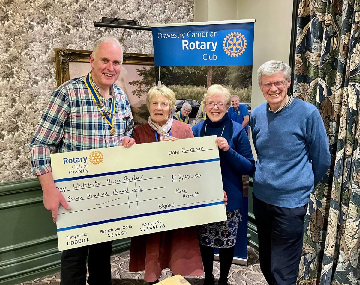 Our president for 2024-2025, David Griffiths, with Graham Moss presenting the Mary Hignett grant to the Oswestry Music Festival organisers.