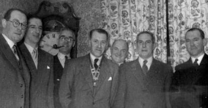 Meeting of Millom Rotary Club in 1954 or 1955 showing Harry Heath, Donald Craft, Arthur Clegg, Ronnie Davis, Ted Driver, Donald Schiefler, and Dudley Grayson