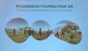 A light blue rectangles bearing the words 'Wilderness Foundation UK' with three photographs in irregular shapes beneath them