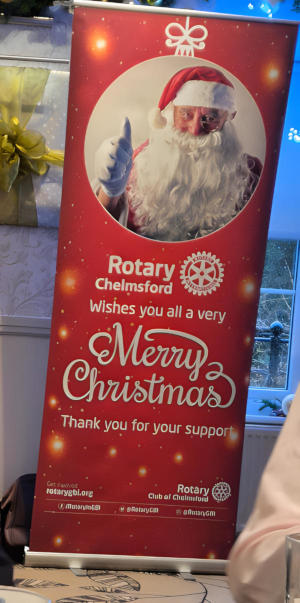 A Rotary pull-up Christmas banner