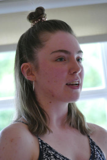 A young woman with long brown hair