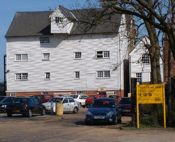 Rear of watermill with white clapboarding