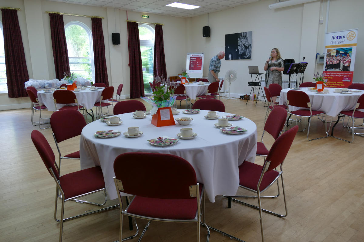 A number of laid dining tables