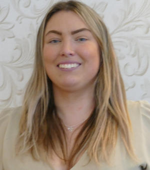 A young woman with long light brown hair