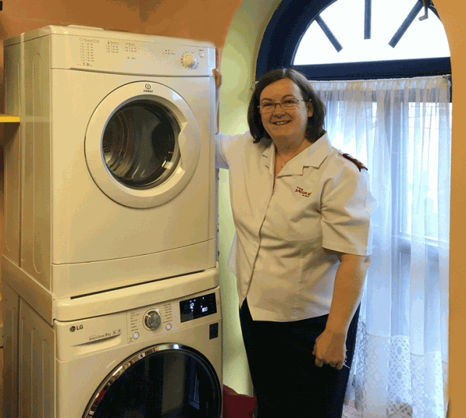 Captain Beccy with the new washing machine and tumble dryer.