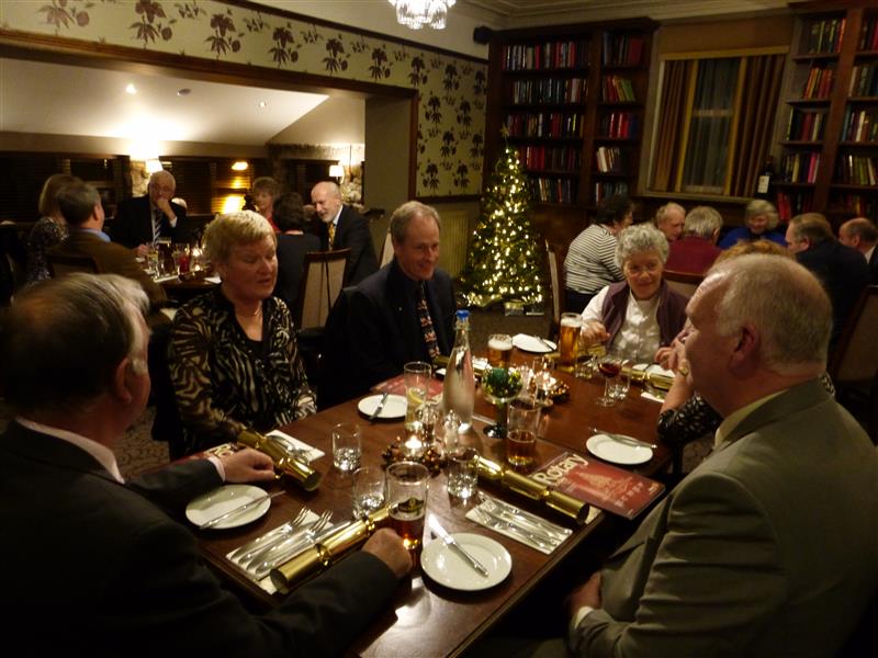 Members enjoying Christmas dinner 2013