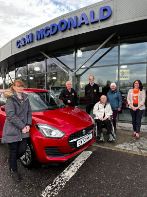 Car being presented to the raffle winner