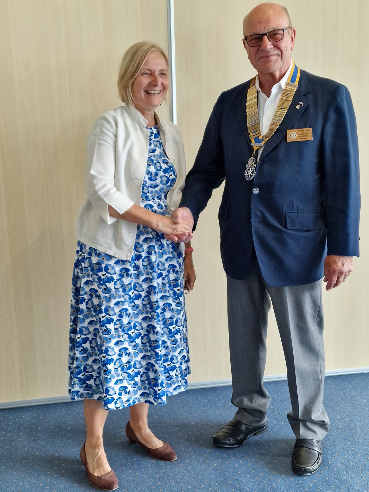 Rotary Parkstone Past President Liz handing over to our New President Alasdair
