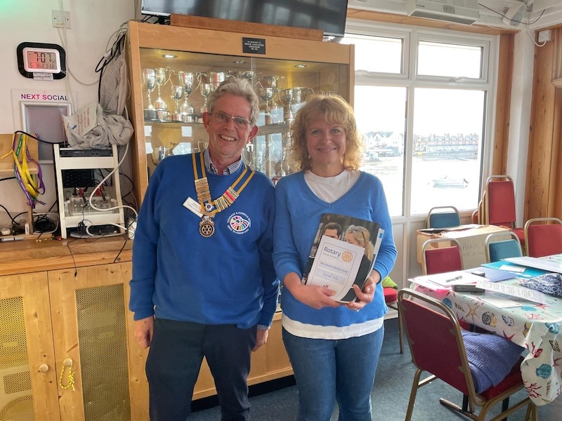 New Rotarian Sarah Vile being welcomed by President Chris
