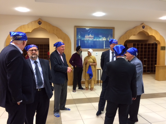 Visit to the Glasgow Gurdwara - Members congregate in the entrance hall