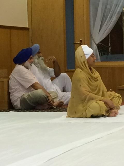 Visit to the Glasgow Gurdwara - Our Ambassador, listening to the scriptures, in the Darbar Hall