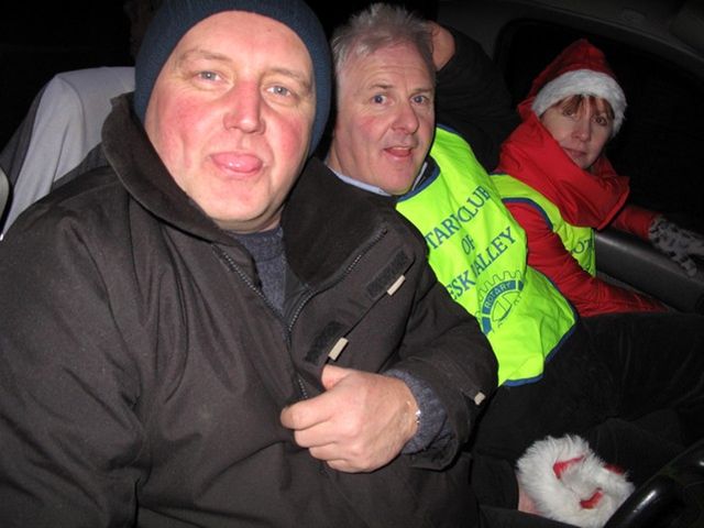 Santa Sleigh & Collections 2010 - Fraser, Colin & Fiona, keeping warm in the Sleigh!