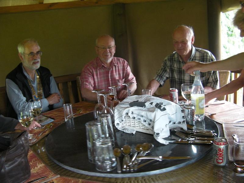 Frugal lunch at Paul Barrett's home - and a surprise award.... - In the roundhouse ready to eat - Clive,Norman, Kim  