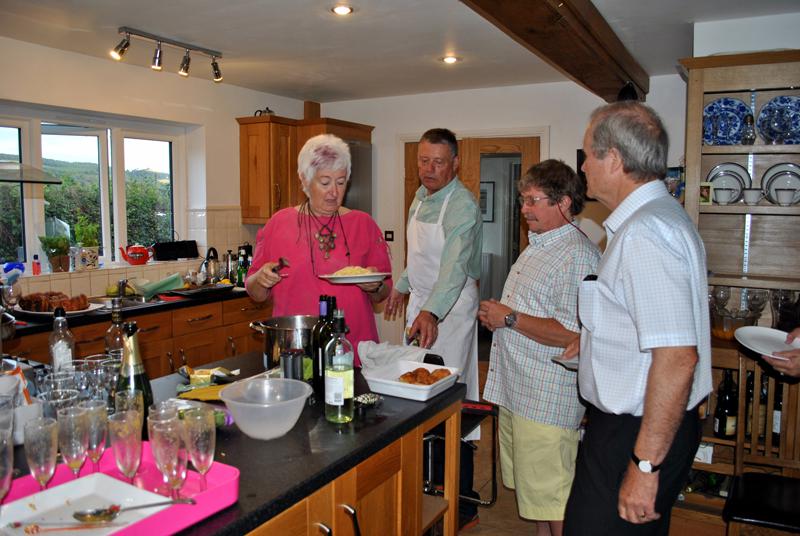 Italian evening at Ian and Carolyn's home in Bucknell - Carolyn and Ian serving the first eager mouths...