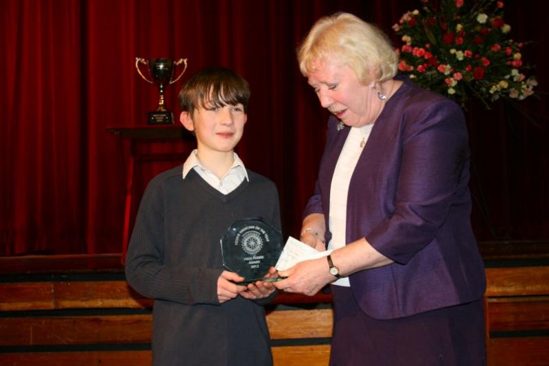 Young Musician Final - 34 Joe Rees receives his trophy from Penny Perkin