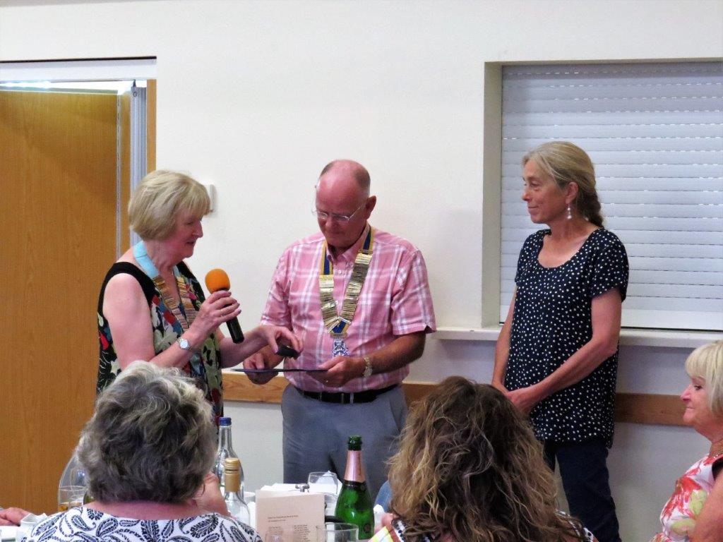 Presidents Evening 29th June 2019 - Allison receiving her Paul Harris Fellowship from District Governor Joan and President Phil