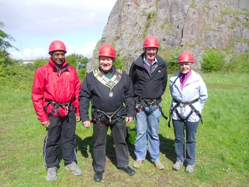 Weston Rotary  - Who are we?  - 2015 President Terry with Chain and other members abseiling in Uphill Quarry fr Charity