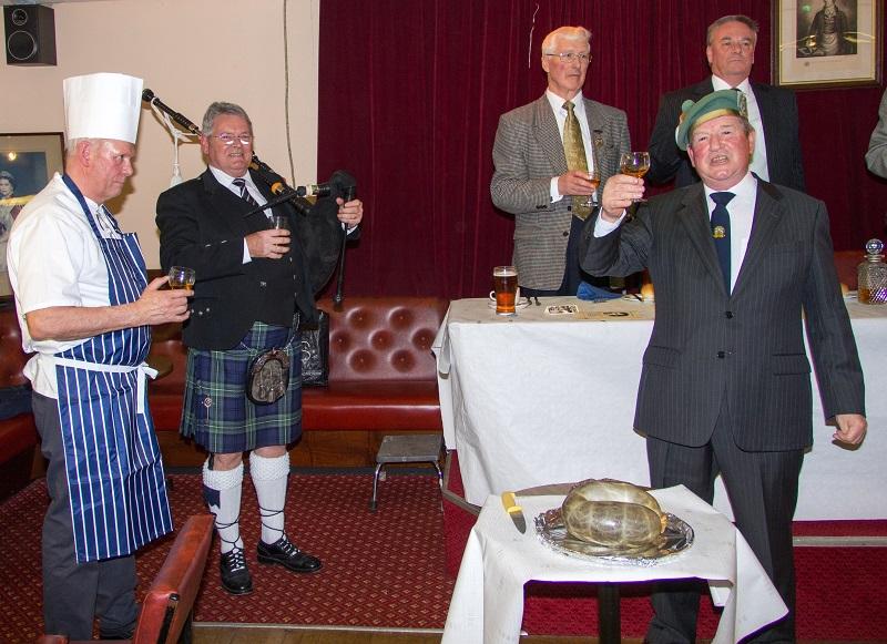 Greenock Rotary Annual Burns Supper - Arthur Boyle addresses the haggis