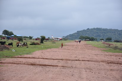 Our funds help to secure a village life line - Aircaft lining up for take off, once the runway is clear !