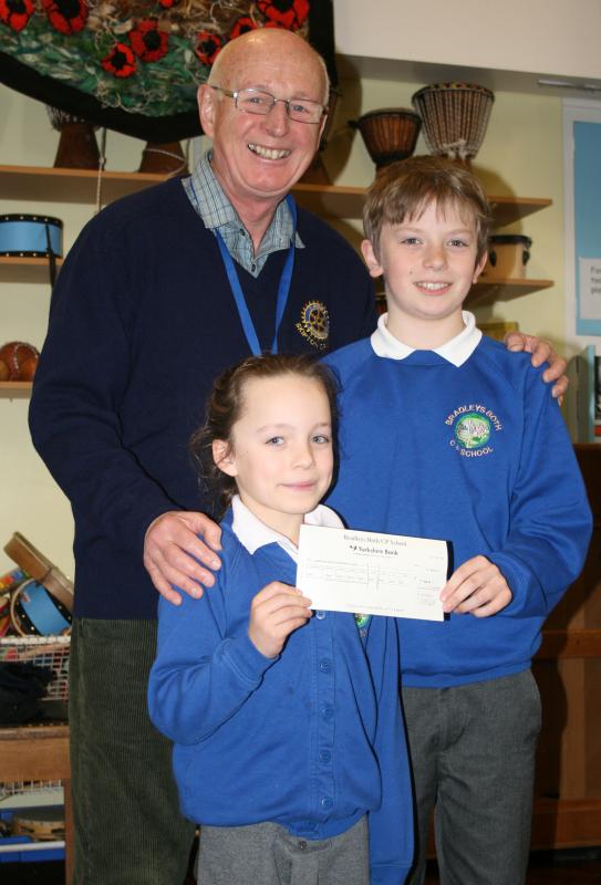 ShelterBox - Receiving a donation from school after a money raising event