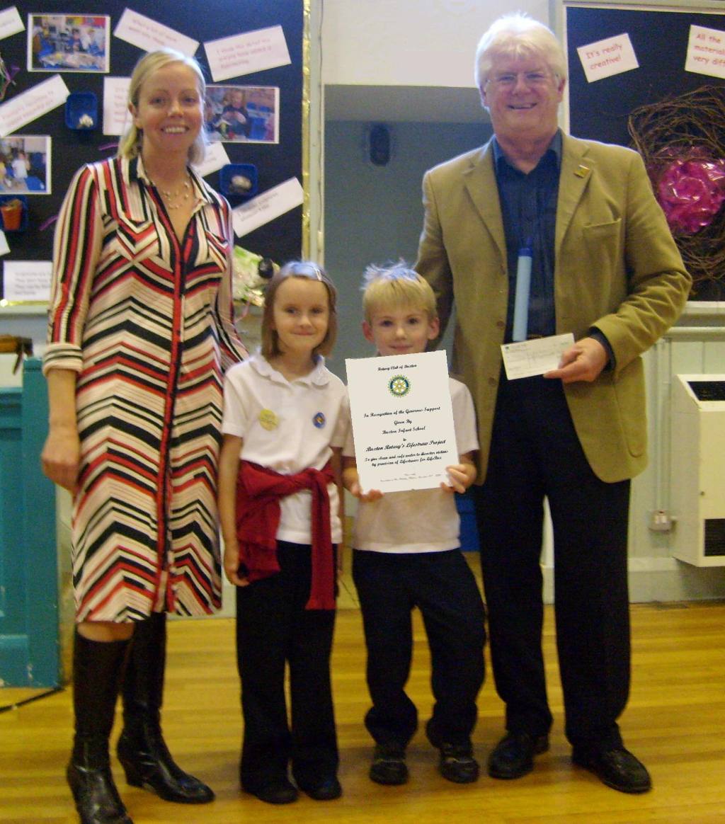 Disaster Aid Effort - Rotary Club of Buxton - After a safe-water talk, Buxton Infants collect for LifeStraws