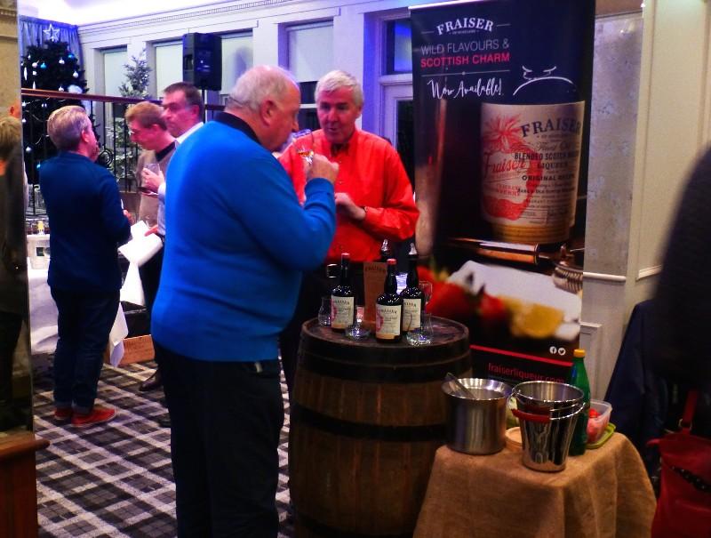 Wine Tasting - A Braids Rotary Club Member enjoying wine tasting at a fund raising event