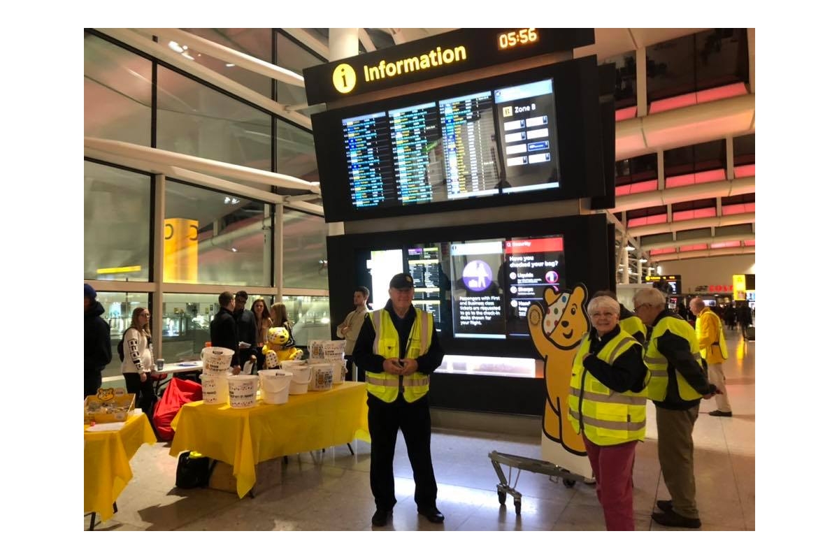 District Governor's Newsletter - December 2018 - Amersham Rotary collecting for Children in Need at Heathrow Airport