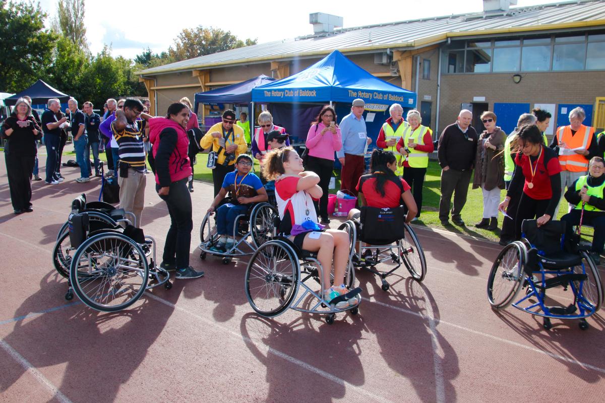 Joint Rotary Clubs Success with “Push4IT” Wheelchair Racing - Warming up before the race is always important