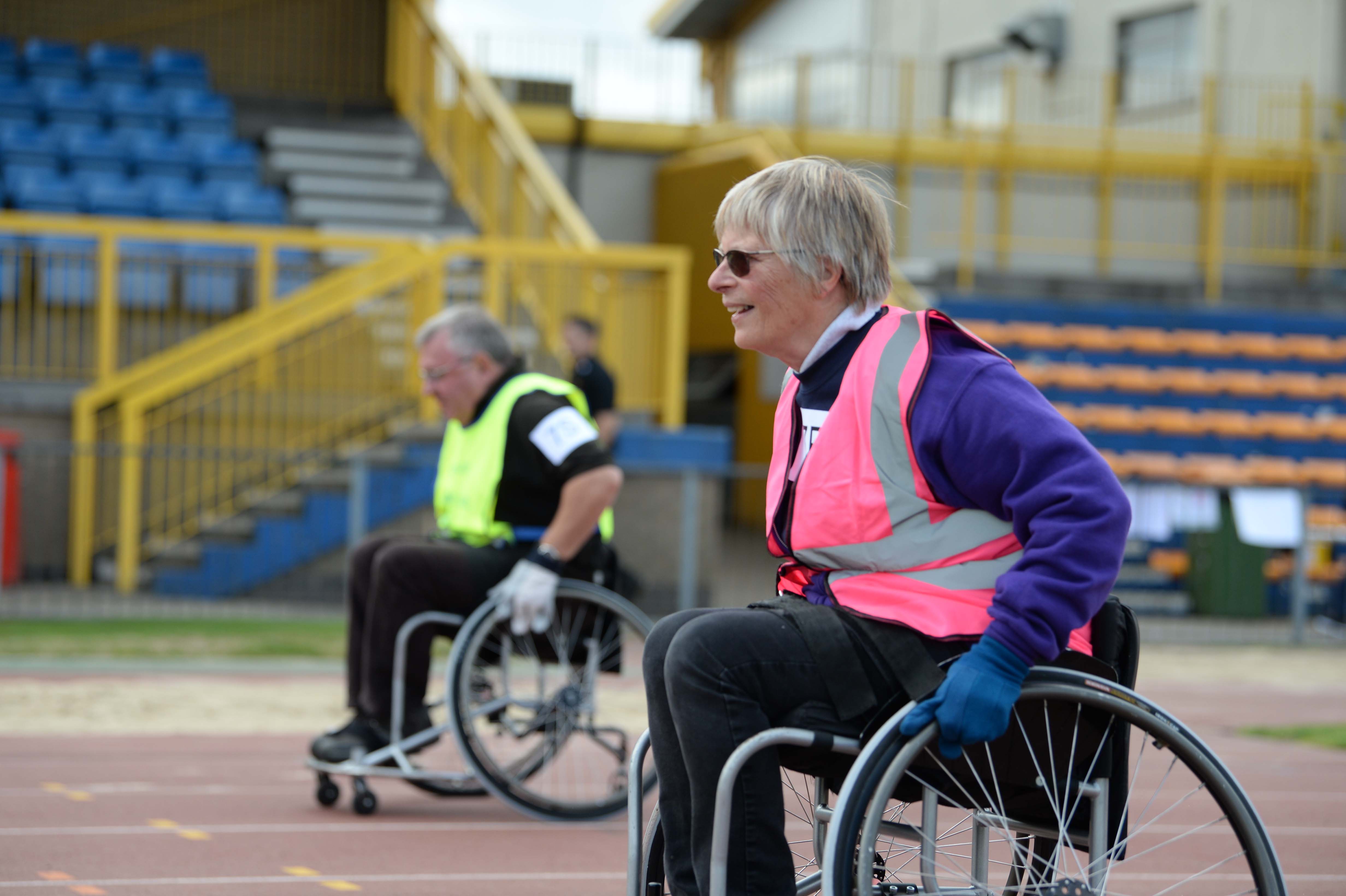 Joint Rotary Clubs Success with “Push4IT” Wheelchair Racing - Mary Whitehead ready for the off in the 4 x 50 metre relay - A study in concentration.