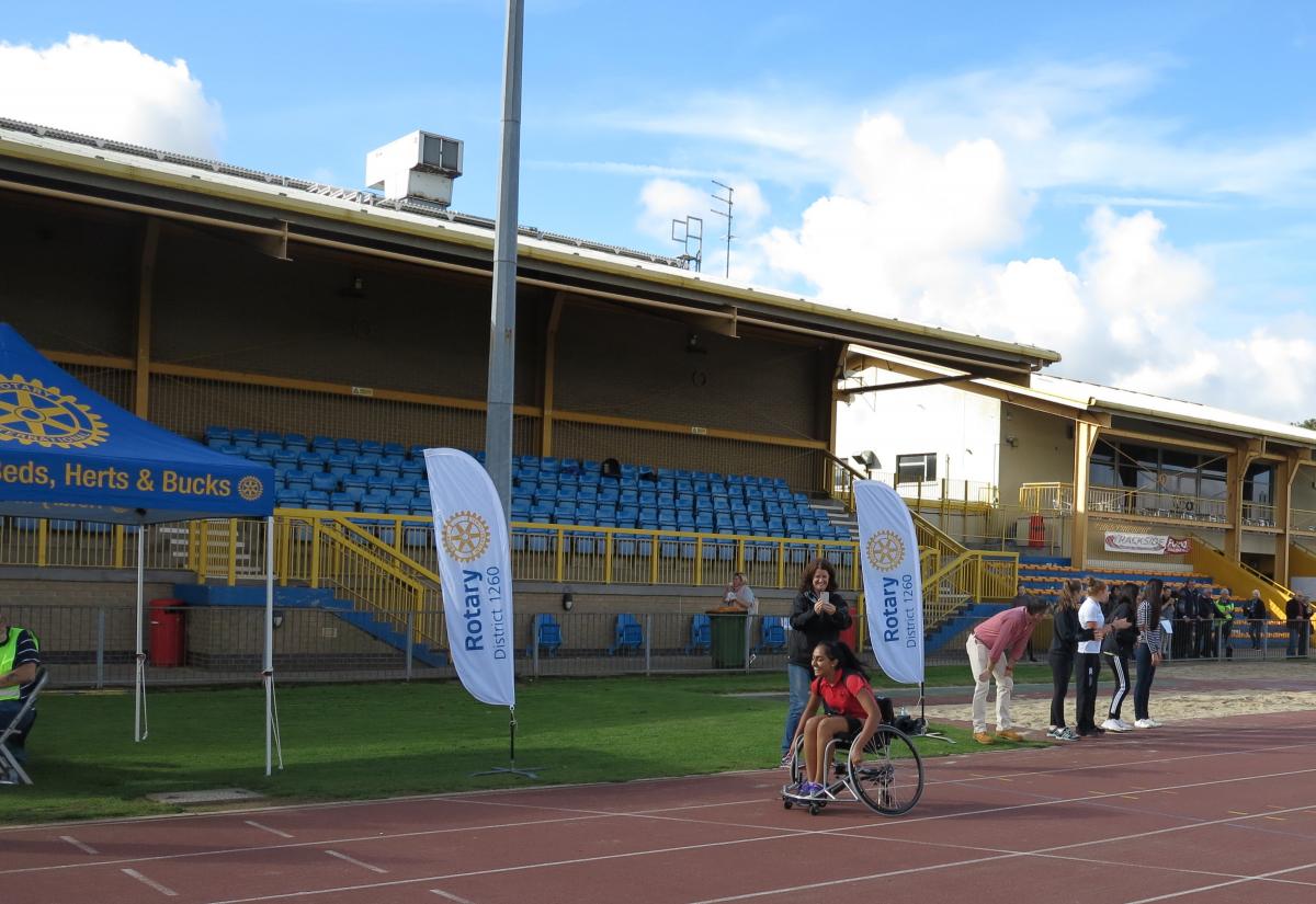 Joint Rotary Clubs Success with “Push4IT” Wheelchair Racing - A young competitor on the track!