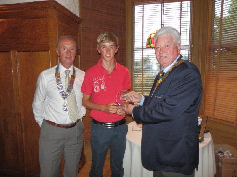 Rotary Year 2012-13 - DG John Barbour with Rob Paterson who took third place in the Rotary Junior Golfer of the Year