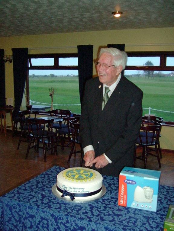 70th Anniversary Cellebrations - Our oldest member, Edgar Knight has the honour of cutting our celebratary Cake