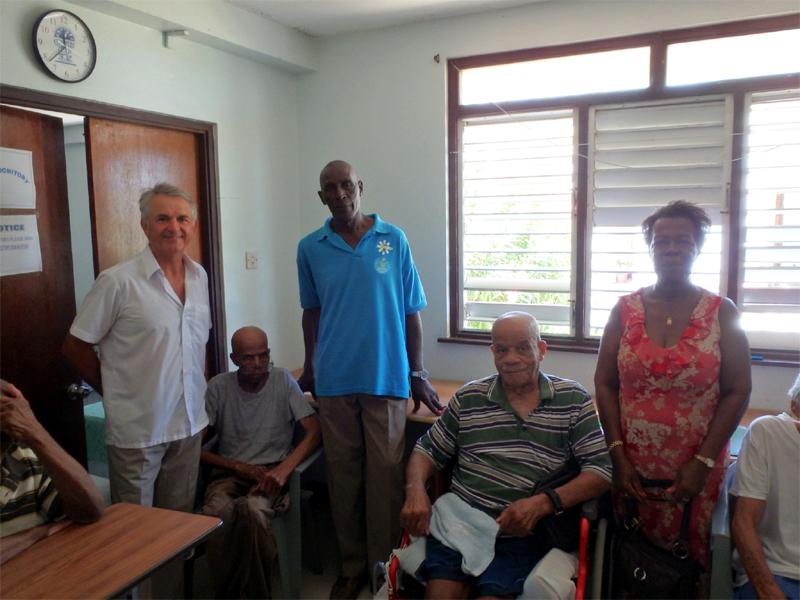 Rotary Community Corp of Carriacou - Dale Worthington at Top Hill Care Home with residents
