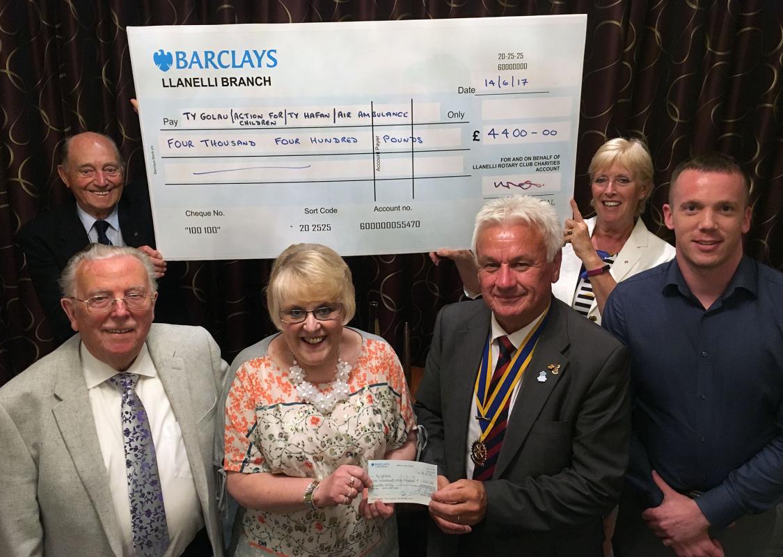 Llanelli Rotary Club presents £4400 to local charities - Santa's Grotto cheques