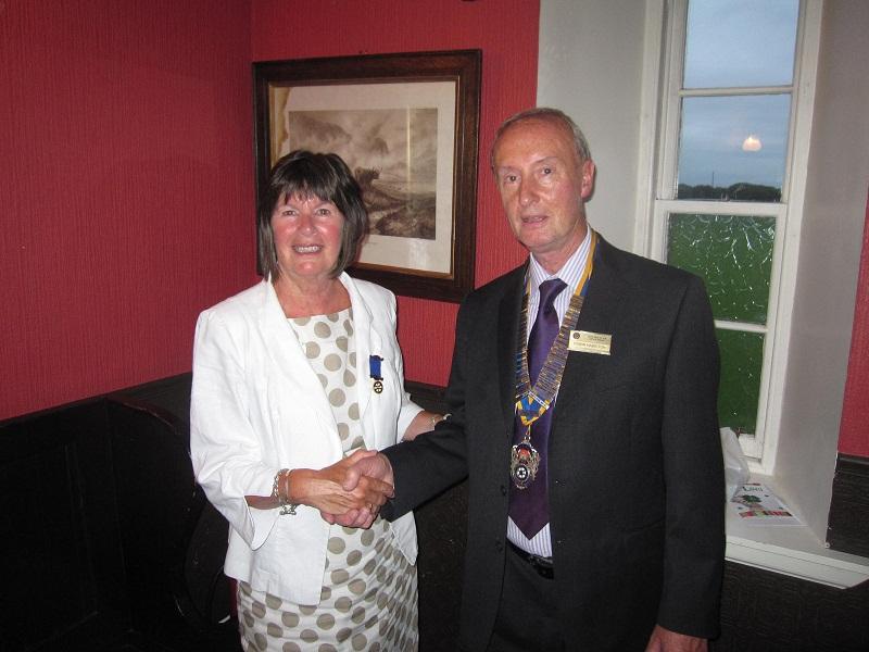 Rotary Year 2012-13 - Retiring President Elaine O'Brien hands over to new President Robin Hamilton