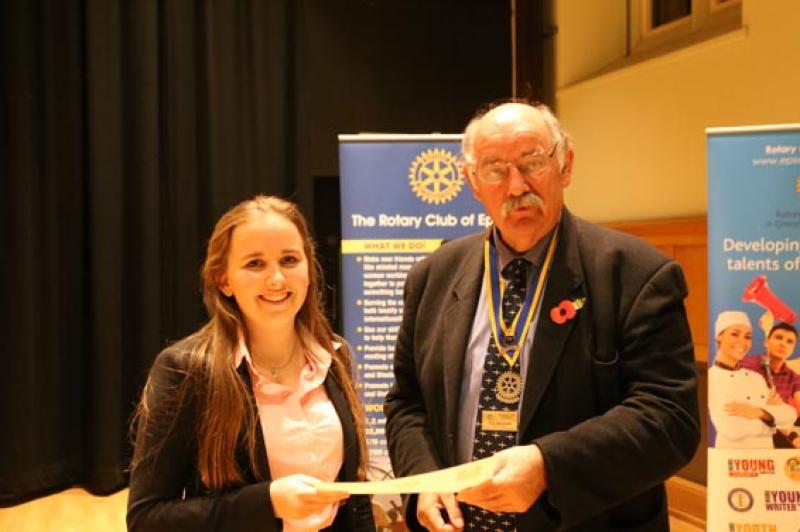 Young Musician Epsom Rotary Heat - Emily Oulton receives a competing certificate from Clive