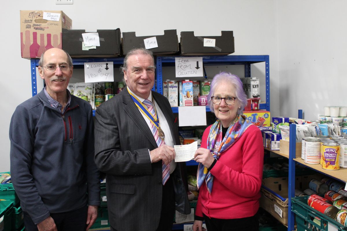 Presentation of Funds To Local Charities - President Hugh and
Rachael Rodway and Stewart Jermin, Treasurer of Carlisle Foodbank looking on