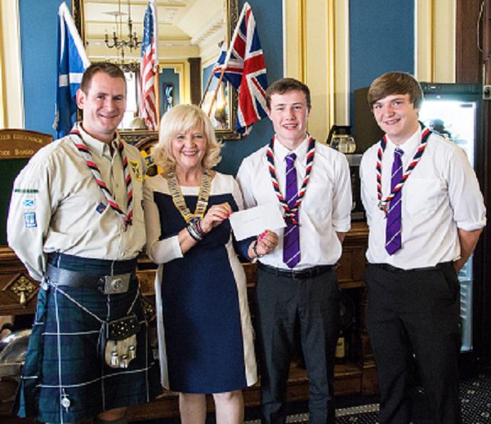 Happy Smiles on Disbursement Day - Mark Gallacher,George Smith & Declan Bolster receive a cheque from President Anne