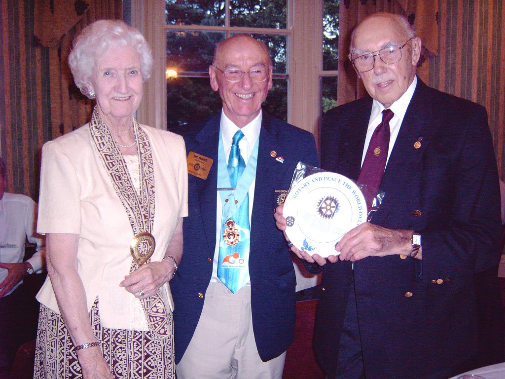 2008-09 Presidential Handover - DG Ken presents a plaque to Peter Hampson for 49 years of Rotary Service