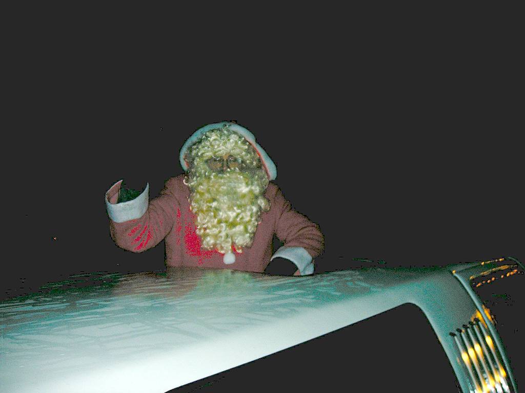 Santa Run 2005 - Santa gets aboard the limo - sleigh's are so last century