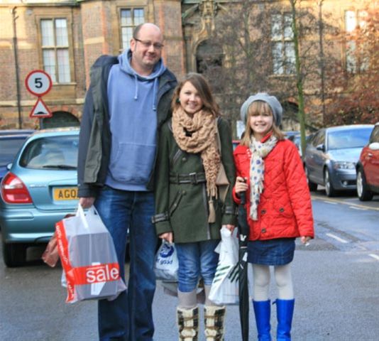 Dec 2011 Christmas Car Parking in Cambridge City Centre - A happy family with their purchases