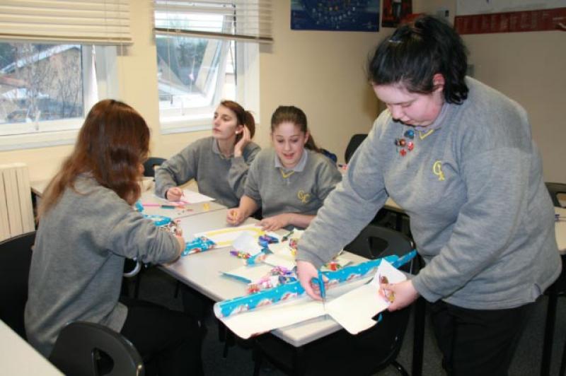 Feb 2012 Comberton Village College Interact Club - The members wrapping presents for the 'lucky dip'