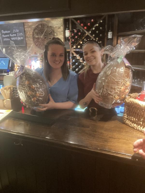 Easter Egg - Seven of our lucky winners - Below the girls from the Carpenters Stanton Wick show the Easter egg that was won by Bob’s Grandchildren in the Chelwood Bridge Rotary Charity Easter Egg Draw. 