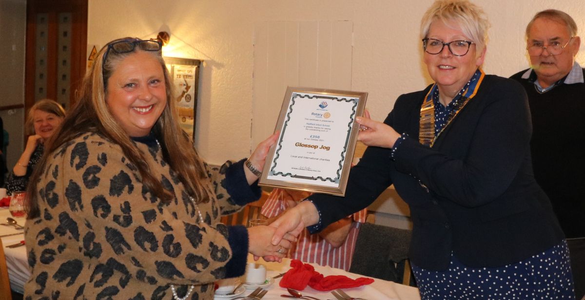 Rotary Jog Presentations - President Gill presents the certificate to Alison Barnes