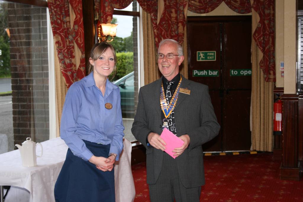 Installation and Other Events - Coroline receiving a gift from members for putting up with us with a smile